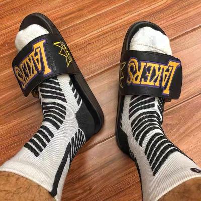 China Latest Fashion Trend Designer Casual Rubber Slippers For Men Shape Logo Pattern Printed Slides Flat Unisex Leather Magic Strap Sandals for sale