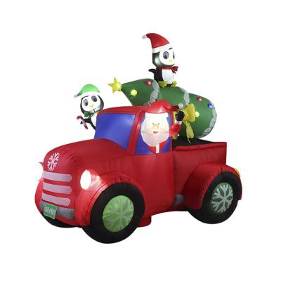 China Holiday Decorations Hot Sale Customized 8FT Christmas Decorations LED Lights Inflatable Santa Pick Up Car With Tree And Penguins for sale