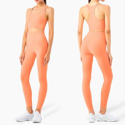 China Two-piece set yoga underwear camisole strap yoga suit top pants nine point no waist breathable female sexy t line for sale