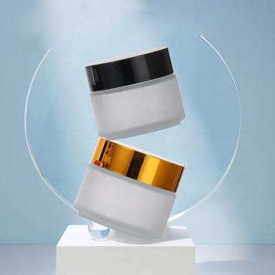 China 5ml Cosmetic 10ml 20ml 30ml 50ml 100ml 20ml 30ml 50ml Frosted Clear Amber Cream Empty Round Packaging Luxury Glass Cosmetic Jars for sale