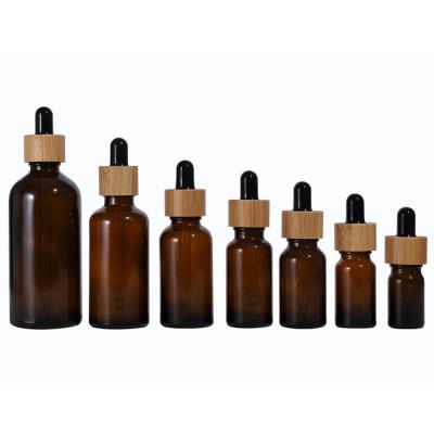 China 5ml Recyclable 10ml 20ml 30ml 50ml 100ml 5ml 10ml 20ml 30ml 50ml 100ml Frosted Glass Essential Oil Dropper Bottle With Bamboo Cap for sale