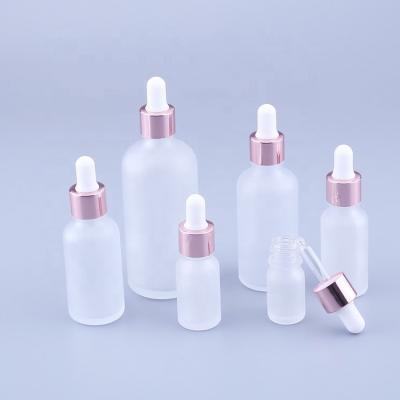 China Cosmetic 5ml 10ml 15ml 20ml 30ml 50ml 100ml Frosted Rose Pink Essential Oil Glass Dropper Bottle for sale