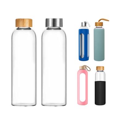 China Viable With 1 Liter Cover Leak Proof Transparent Pink Clear Silicone 18oz Silicone 18oz Glass Sleeve BPA Free Large Bamboo Water Bottle for sale