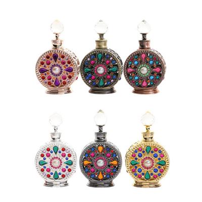 China Vintage Metal Dubai Perfume Oil Bottle 15ml 12ml Recyclable Luxury Antique Essential Oil Bottle Glass Dropper for sale