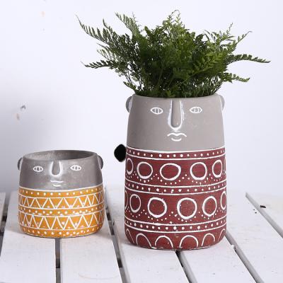 China Wholesale Nordic Cute Face Cement Novelty Cartoon Indoor Plant Succulent Pots For Sale for sale