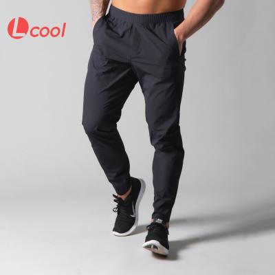 China Anti-Wrinkle Lcool Wear Workout Sporty Fitness Pants Jogger Sweatpants Sportswear Elastic Pants For Men for sale