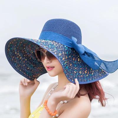 China Fashion Large Brim Bowknot Summer Soft Wide Foldable Sombreros Paper Beach Sun Straw Hat For Women for sale