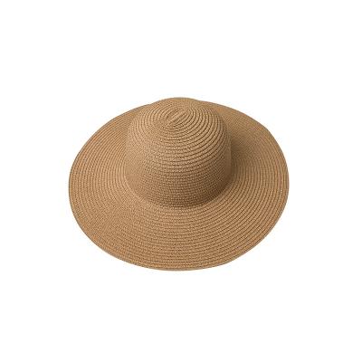 China Custom Simple Wide Paper Sun Hat Summer Beach Dobby Soft Brim Women Straw Hats for sale