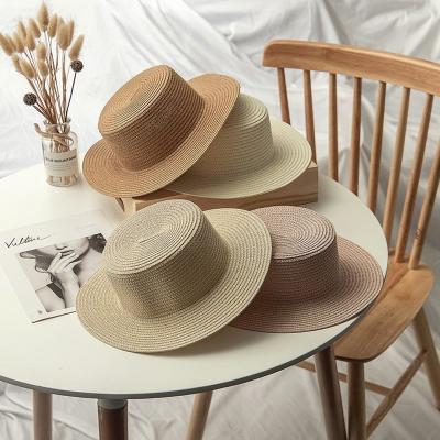 China Simple Custom Paper Character Panama Straw Hat Beach Sun Hat Flat Surface Summer Women Straw Hats for sale