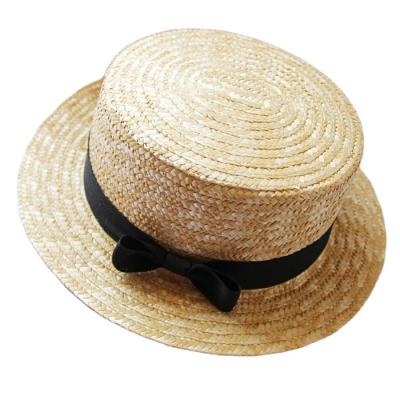 China Wholesale Sun Straw Cap Summer Boater Straw Flat Top Women Wheat Bowknot Picture Ladies Sun Hat for sale