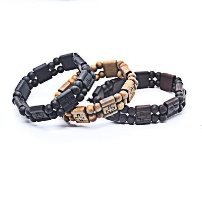 China 2022 New Design Christian Wooden Beads Elastic Bangle Religious Cross Religious Pendant Men's Wrist Bracelet for sale