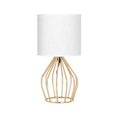 China Small Basic Modern Gold Pattern Iron Bedside Lighting Bedroom Desk Lamps Table Lamp Fabric for sale