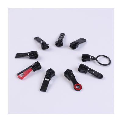 China Other 3# 5# 8# Rubber Zinc Alloy Metal Tooth 3# 5# 8# Rubber Self-Locking Zipper Puller Pull Card Luggage Pull Card Resin Pull Head Plastic for sale