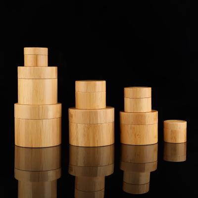 China Round Empty Refillable Environmental Plastic Containers Cosmetic Bamboo Jars With PP Inners for sale