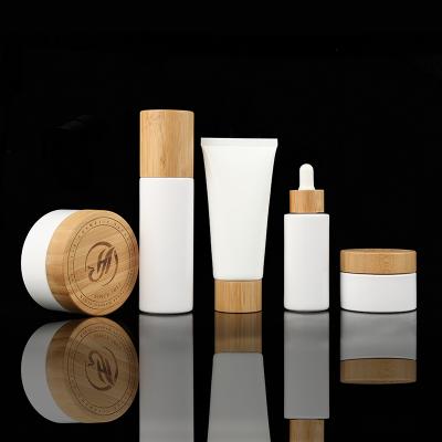 China Hot Selling Cosmetic Glass Liquid/Lotion Cream Container 50g Cosmetic Glass Jar Empty Face Glass Bottles Set for sale