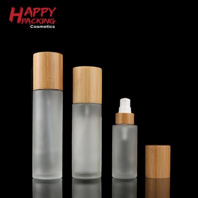 China Eco-Friendly Bamboo Pump 30ml 50ml 100ml 120ml 150ml Personal Care Serum Bottle Glass for sale