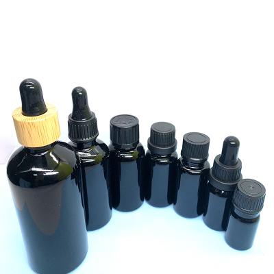 China Cosmetic 30ml 1oz Original Luxury Black Bamboo Glass Dropper Bottle For Essential Oil for sale