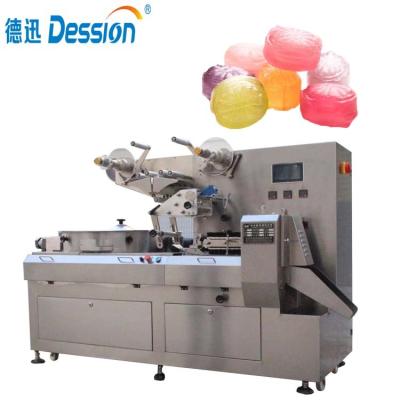 China Automatic High Speed ​​Small Sachet Ice Food Plastic Candy Sweet Packing Machine for sale