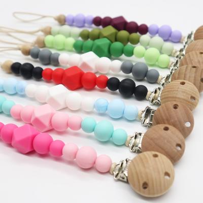 China BPA Free Chewable Beaded Holder Clip Wooden Baby Soother Silicone Soother Dummy Chain for sale