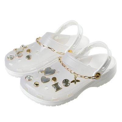 China Late Summer Clear Massage Women's Casual Clogs Blast Slipper Jelly Wedges Jeweled Platform Clog Sandals For Women Transparent Clogs for sale