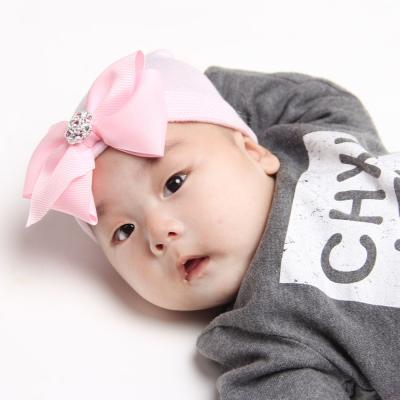 China JOINT Big Bow Pink Rhinestone Striped Hat Tire Hat Cute Newborn Baby Hat for sale