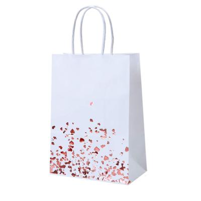 China Recyclable Custom Printing Sequin Kraft Paper Luxury Shopping Gift Bags With Handles for sale