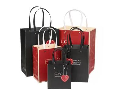 China Wholesale Recyclable Bulk Red Black Paper Bags With Your Own Logo For Wedding Shops Business Birthday Parties Retail Christmas for sale