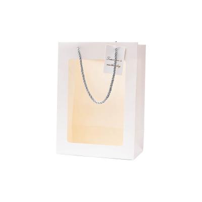 China Recyclable Best Selling Recyclable Medium Transparent Paper Gifts Packaging Luxury Shopping Bag for sale