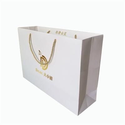 China Colorful Recyclable Wholesale Custom Printed Paper Shopping Bag With Handles for sale