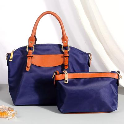 China 2021 European new fashion beauty bag 2 piece set in the running bag Oxford cloth large single-shoulder messenger bag for sale