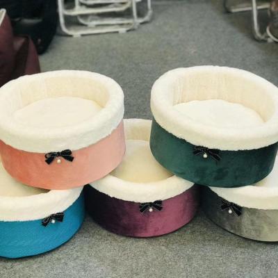 China Hand Wash New Design Soft Washable Cat Bed Small Dog Bed Round Pet Bed With Bowknot for sale