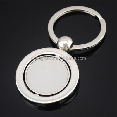 China New White Rotating Metal Car Key Chain Custom Logo Key Ring for sale