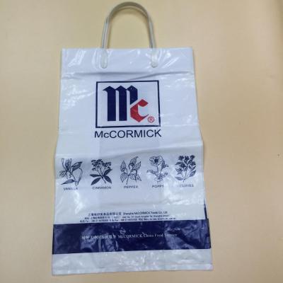 China Factory BIODEGRADABLE Soft Xiamen Buckle Handle Plastic Bag Good Capacity for sale