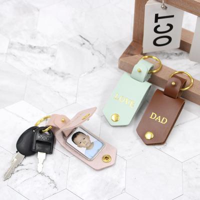 China Mini ECD Key Chain Photo Souvenir Gifts Portable Photo Frame Holder Promotion With Leather Cover Photo Key Chain for sale