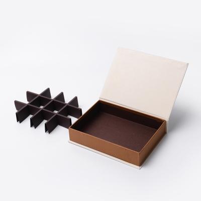 China Handmade Custom Fancy Luxury Grids 12 Book Shape Candy Chocolate Flip Magnetic Cardboard Packaging Gift Boxes for sale