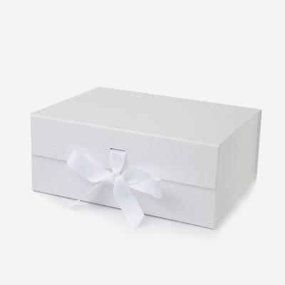 China Handmade Custom Logo Design Skirt Big White Ribbon Magnetic Narrow Folding Packaging Gift Box For Shopping for sale