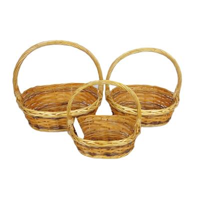 China Viable Set of 3 Straw Oval Fruit Baskets with Handles Wicker Rack Baskets Handles Wood Waste Gift Basket Storage Wholesale Factory for sale