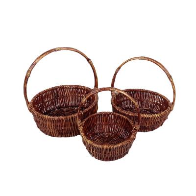 China Sustainable Round Dark Brown Rattan Storage Baskets For Gifts Fruits With Handles Wicker Storage Box Rustic Style Food Storage Baskets for sale