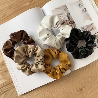 China Soft Korean Women Leather Girls Scrunchie PU Elastic Hair Bands Accessories Link Hair Ring Rope Headdress Headdress for sale