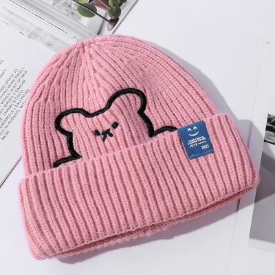 China COMMON winter knitted hats for women geometric woolen knitted hat solid de mujer gorros skullcap inviern handmade hat for sale