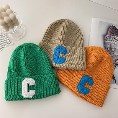 China COMMON Knitted Winter Woolen Women's Red Hat Leisure Hat Skull Cap Warm Elastic Outdoor Hat Black for sale