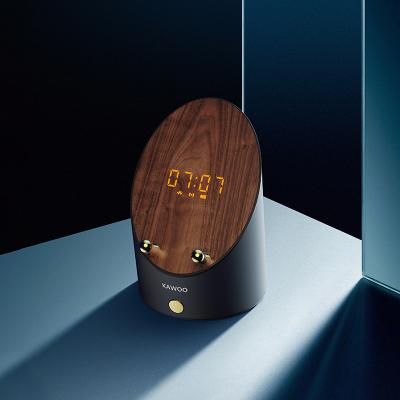 China Wireless Hot Wood Loud Loud Smart Loudspeaker Mobile Phone Induction Digital Pendulum Pendulum Blue Tooth for sale