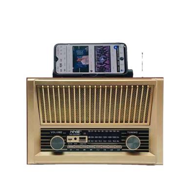 China Bass Speaker Retro Wood Grain FM Radio TF Card U Disk Music Player Portable Multifunctional Audio Portable Radio Blue Tooth Speaker for sale