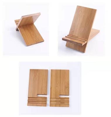 China PORTABLE Professional Multifunctional Foldable Mobile Phone Stand Manufacturing Bamboo Wooden Primary Color for sale