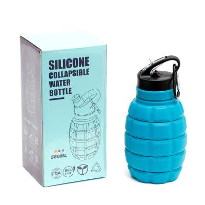 China Sustainable Collapsible Pomegranate Water Bottle Food Grade Silicone Cycling Expanding Water Bottle With Hook Carabineer for sale