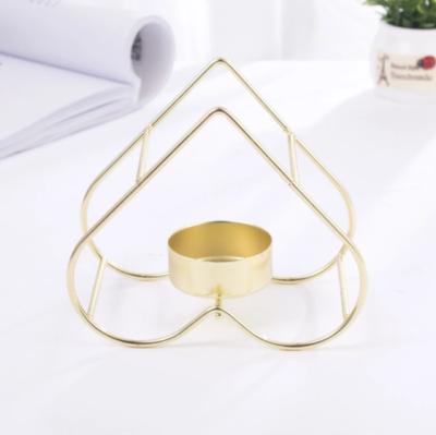 China Geometric Weddings Ins Love Heart Metal Gold Ornament Dinner Table Candle Holder for sale