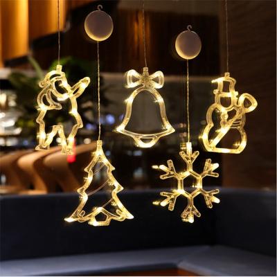 China Merry Five-pointed Christmas Decoration LED Bell Sucker LED Lamp Star Angel Elk Snowman Fairy Tale Character Lamp Flashing Five-pointed Window for sale