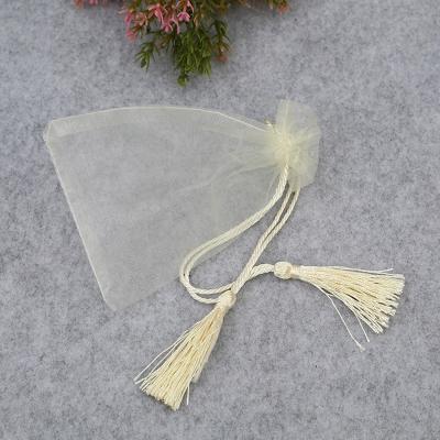 China Promotion Organza Beige Drawing Bag With Tassel Jewelry Makeup Packaging Bags Transparent Yarn Gauze Pouches Display Box Package for sale