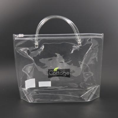 China Customized Clear Transparent Portable Shopping Bags PVC Zipper Gift Moisture Proof Bag With Handles for sale