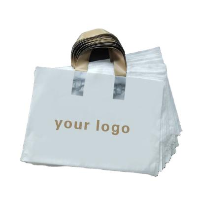 China Disposable Plastic Die Cut Shopping Bag Apparel Custom Printing Handle Bag With Handle for sale